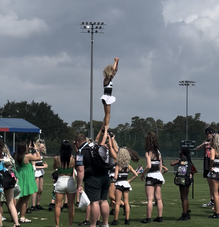 cheerleaders practicing on the field at Disney ESPN wide world of sports